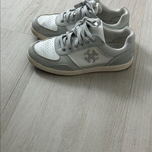 Tory Burch grey and white leather sneakers 
Super soft and comfortable